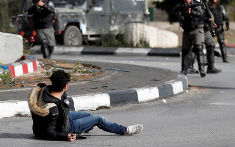 Mohammed Aqal, 29, stabbed a border police officer at a checkpoint in the occupied West Bank while wearing what appeared to be a suicide vest, before being shot three times by police - Credit:  GORAN TOMASEVIC/ REUTERS