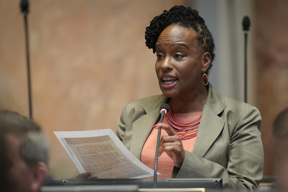 FILE - In this March 2, 2020, file photo, state Rep. Attica Scott, D-Louisville, speaks on the floor of the House of Representatives at the Capitol in Frankfort, Ky. Kentucky State Rep. Attica Scott, one of two Black women in the state legislature, has announced plans to try to unseat longtime Democratic Congressman John Yarmuth in the state’s only congressional seat controlled by Democrats. In a video announcing her candidacy released Wednesday morning, July 7, 2021, Scott referenced her background as community organizer and activist, declaring that Kentucky's largest city needs “a leader who sees this glaring inequality has the empathy to understand it, and the resolve to address it.” (AP Photo/Bryan Woolston, File)