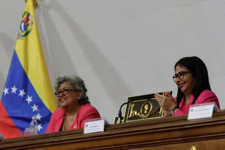 Venezuela's National Electoral Council (CNE) President Tibisay Lucena (L) and President of Venezuela's National Constituent Assembly Delcy Rodriguez attend the swearing in ceremony for newly elected governors at Palacio Federal Legislativo, in Caracas, Venezuela October 18, 2017. REUTERS/Marco Bello