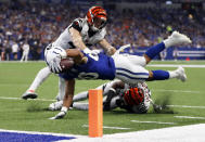 <p>Indianapolis Colts running back Jordan Wilkins (20) attempts to dive for the end zone in front of Cincinnati Bengals safety Clayton Fejedelem (42) during the first half of an NFL football game in Indianapolis, Sunday, Sept. 9, 2018. (AP Photo/Jeff Roberson) </p>