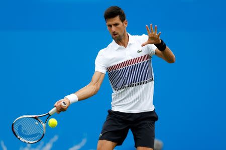 Tennis - WTA Premier - Aegon International - Devonshire Park Lawn Tennis Club, Eastbourne, Britain - June 28, 2017 Serbia's Novak Djokovic in action during his second round match against Canada's Vasek Pospisil Action Images via Reuters/Matthew Childs