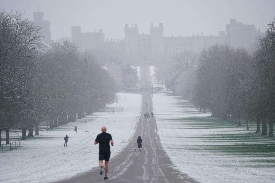 A snowy scene looking along the Long Walk towards Windsor Castle, Berkshire, as parts of the UK wake up to snow and a yellow weather warning (Yui Mok/PA Wire)