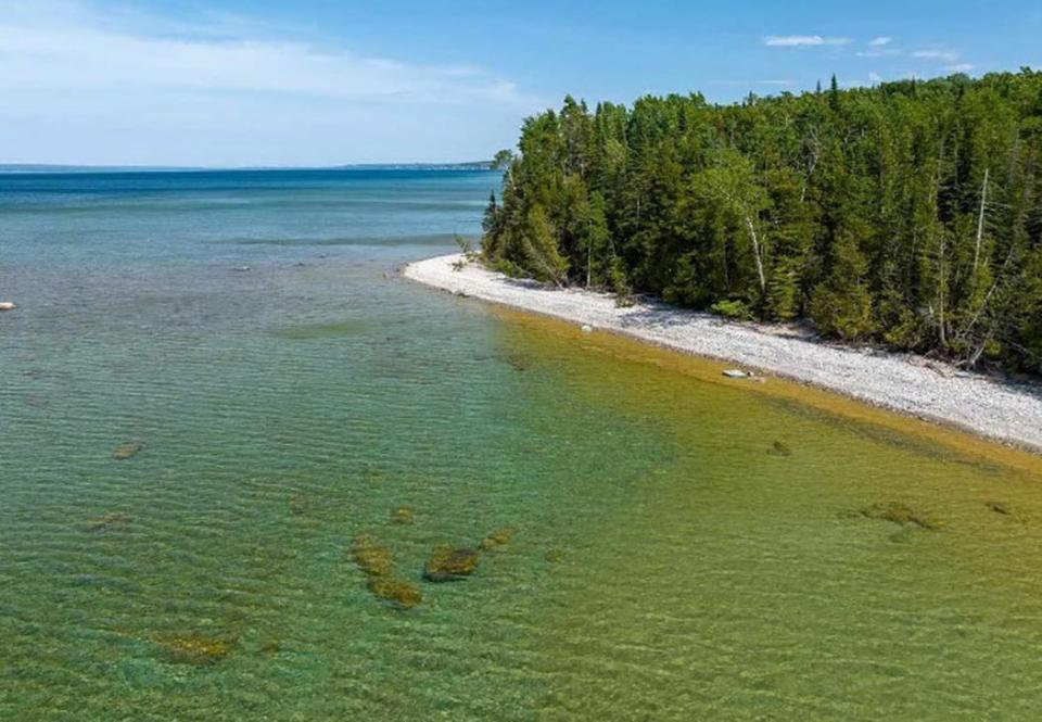 The Enji-minozhiiyaamigak preserve includes a 1/4 mile of shoreline on Lake Michigan.