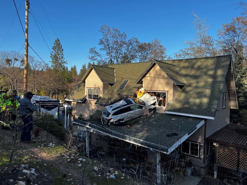 Authorities are investigating how the vehicle landed on the carport roof. The hill next to the home is level with the carport. / Credit: CAL FIRE Nevada Yuba Placer Unit