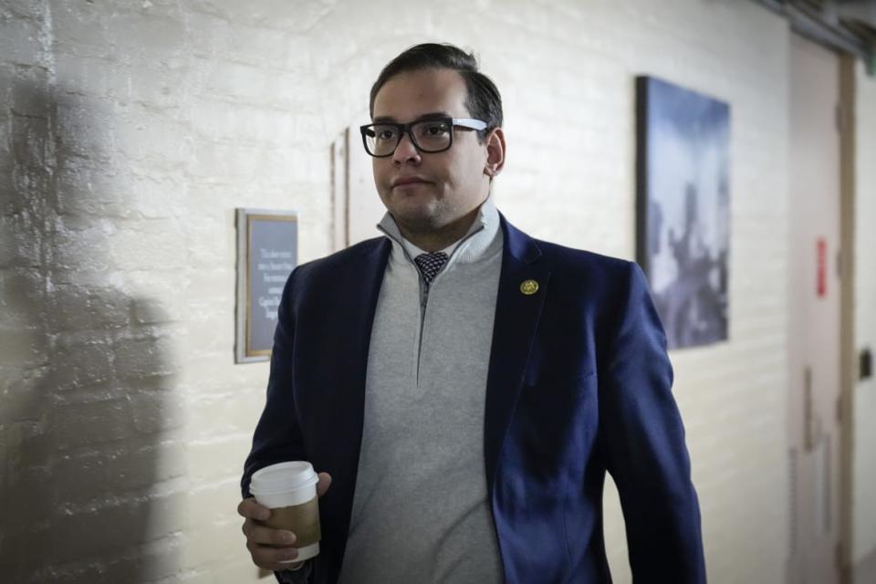 Rep. George Santos heads to a GOP caucus meeting at the Capitol in January. He said over the weekend that advice he got from a fellow Republican, Sen. Mitt Romney, was akin to Rosa Parks’ being told to move to the back of the bus. (Photo by Drew Angerer/Getty Images)