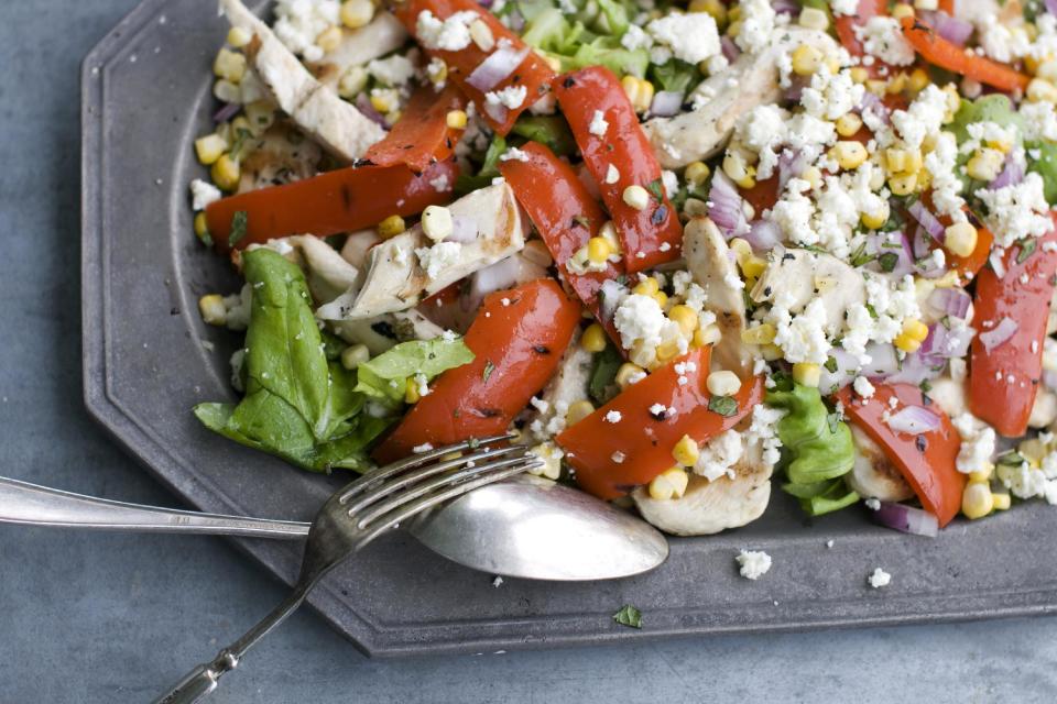 In this image taken on May 20, 2013, grilled Greek chicken salad is shown on a serving platter in Concord, N.H. (AP Photo/Matthew Mead)