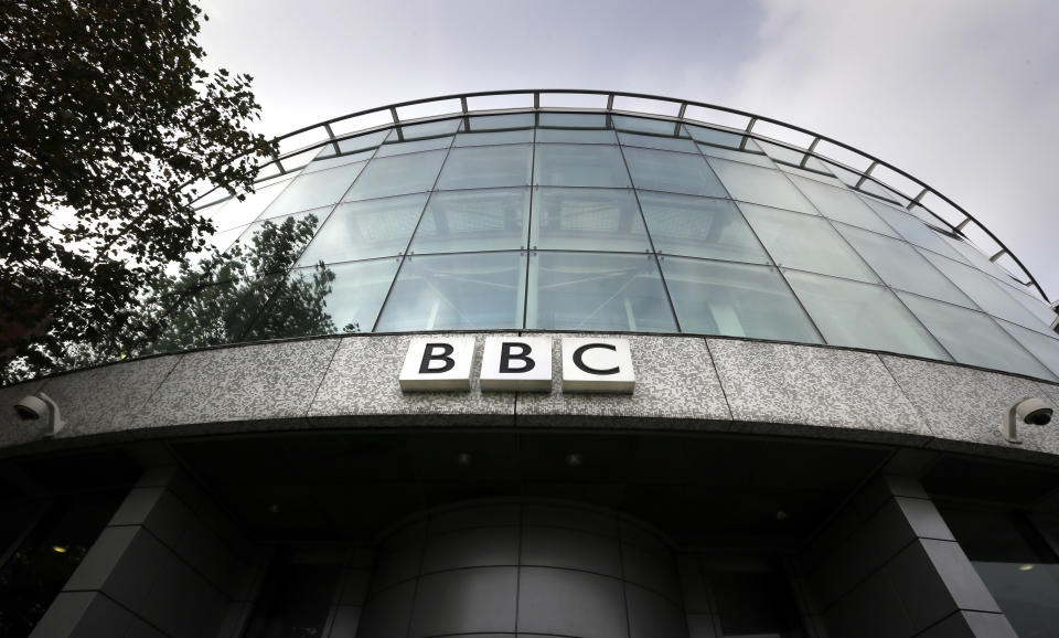 A sign is seen at the entrance to a building at the BBC Television Centre, in London Wednesday, Oct. 24, 2012. The BBC is facing questions over sexual abuse allegations against former television presenter Jimmy Savile. (AP Photo/Kirsty Wigglesworth)