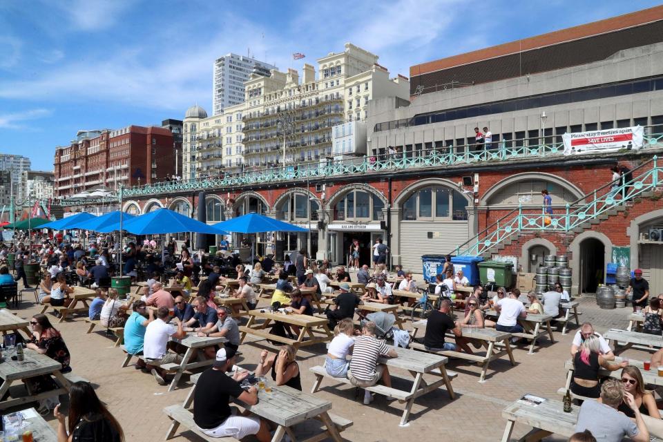 Bars and cafes were busy on Brighton seafront (PA)