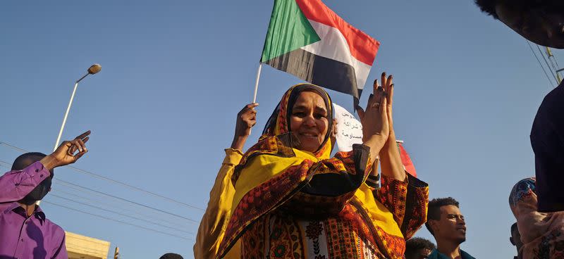 People attends a protest in Khartoum