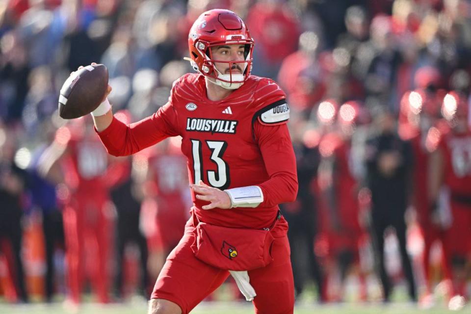 Nov 25, 2023; Louisville, Kentucky, USA; Louisville Cardinals quarterback Jack Plummer (13) looks to pass against the Kentucky Wildcats during the second half at L&N Federal Credit Union Stadium. Kentucky defeated Louisville 38-31. Mandatory Credit: Jamie Rhodes-USA TODAY Sports