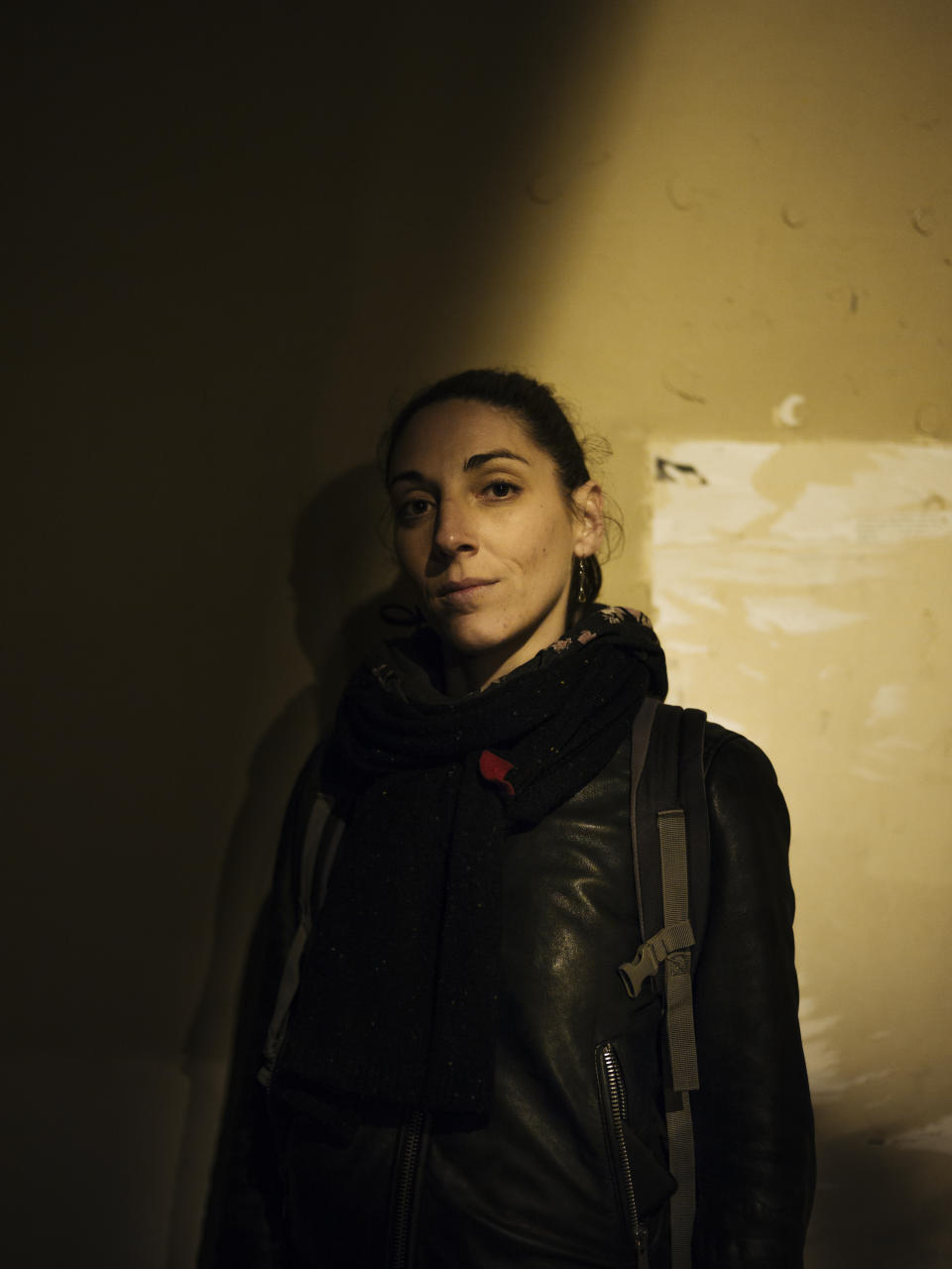 Cindy, 36, a head waitress from Paris poses for a portrait in Paris. Cindy witnessed domestic violence with her neighbors when she was a child. Today she's a mother of a 13 year-old daughter and participating in sign-pasting is for her an easy way to be an activist. (Photo: Kamil Zihnioglu/AP)