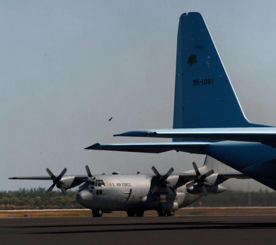 A U.S. Air Force Hercules C-130 plane sits on the runway at Homestead Air Reserve.