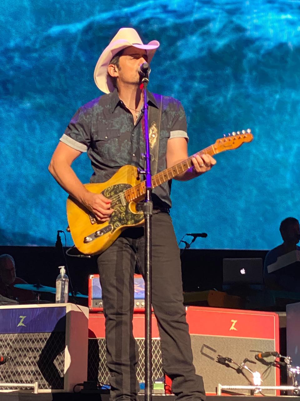 Shown performing at the 2021 Concert for Legends in Canton, country music star Brad Paisley will headline the first night of the Neon Nights music festival at Clay's Resort Jellystone Park in August.