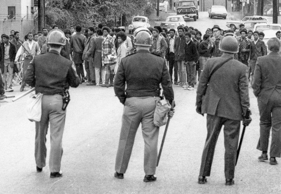 Parker High School in Greenville, S.C. 1970, law officers keep an eye on students at Parker High School on the first day of integration in 1970.