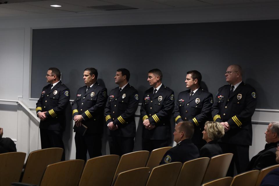 Brent Vickers, far left, listens to Southaven Mayor Darren Musselwhite's comments just before being sworn in as police chief, Tuesday, Jan. 30.