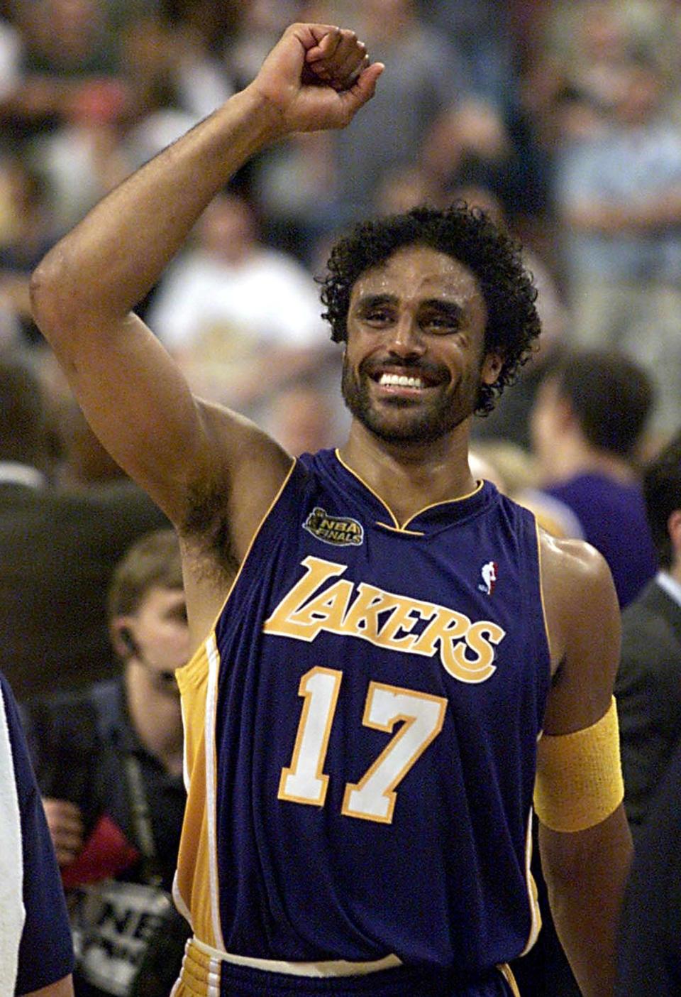 Rick Fox of the Los Angeles Lakers celebrates at the end of game five of the NBA Finals against the Philadelphia 76ers 15 June, 2001 at First Union Center in Philadelphia, PA.