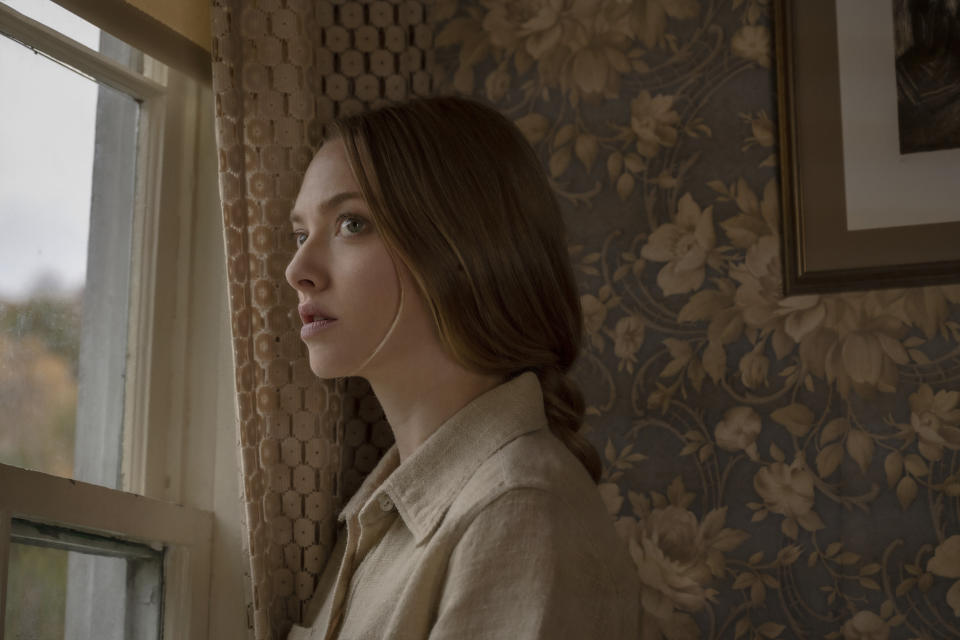 This image released by Netflix shows Amanda Seyfried in a scene from "Things Heard And Seen." (Anna Kooris/Netflix via AP)