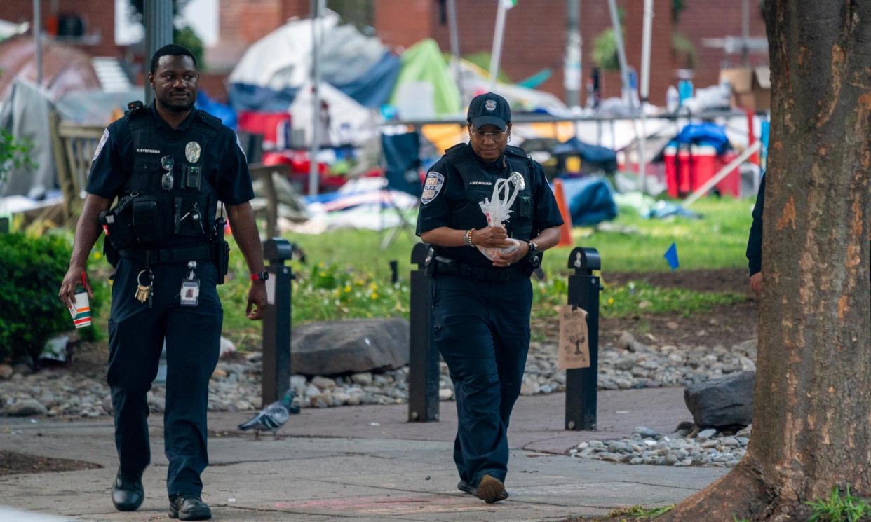 <span>Police work at the scene following the removal of a pro-Palestinian encampment at George Washington University in Washington DC on Wednesday.</span><span>Photograph: Shawn Thew/EPA</span>