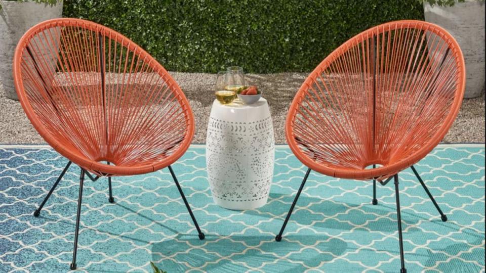 These woven patio chairs will add style to any outdoor space.