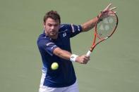 Stan Wawrinka of Switzerland hits a return to Hyeon Chung of South Korea during their second round match at the U.S. Open Championships tennis tournament in New York, September 3, 2015. REUTERS/Carlo Allegri