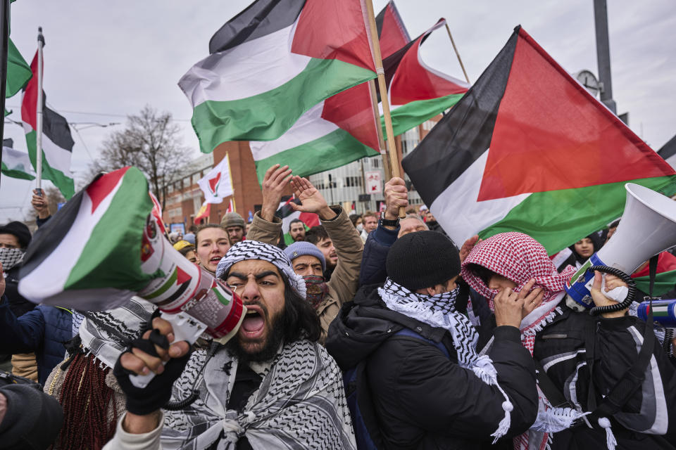 Demonstrators protest against Israel's President Isaac Herzog attending the opening of the new National Holocaust Museum in Amsterdam, Netherlands, Sunday, March 10, 2024. (AP Photo/Phil Nijhuis)