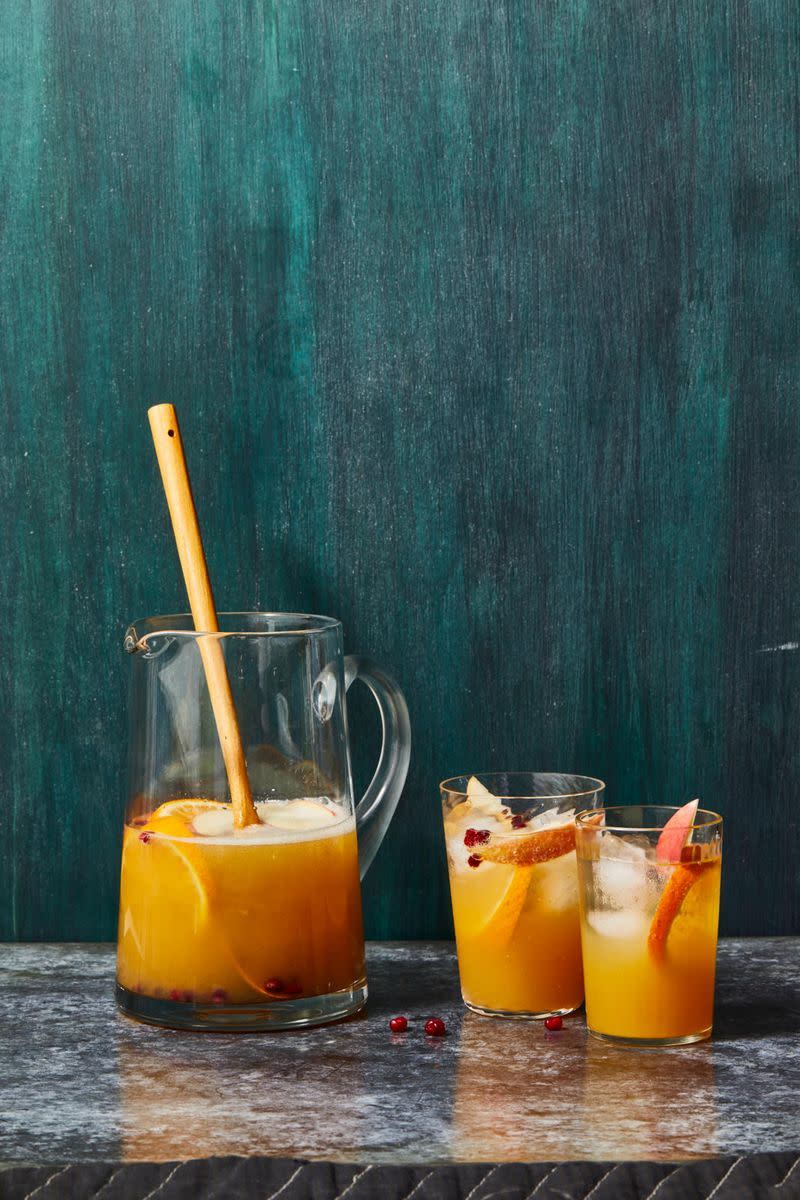 apple cider sangria in a pitcher and glass
