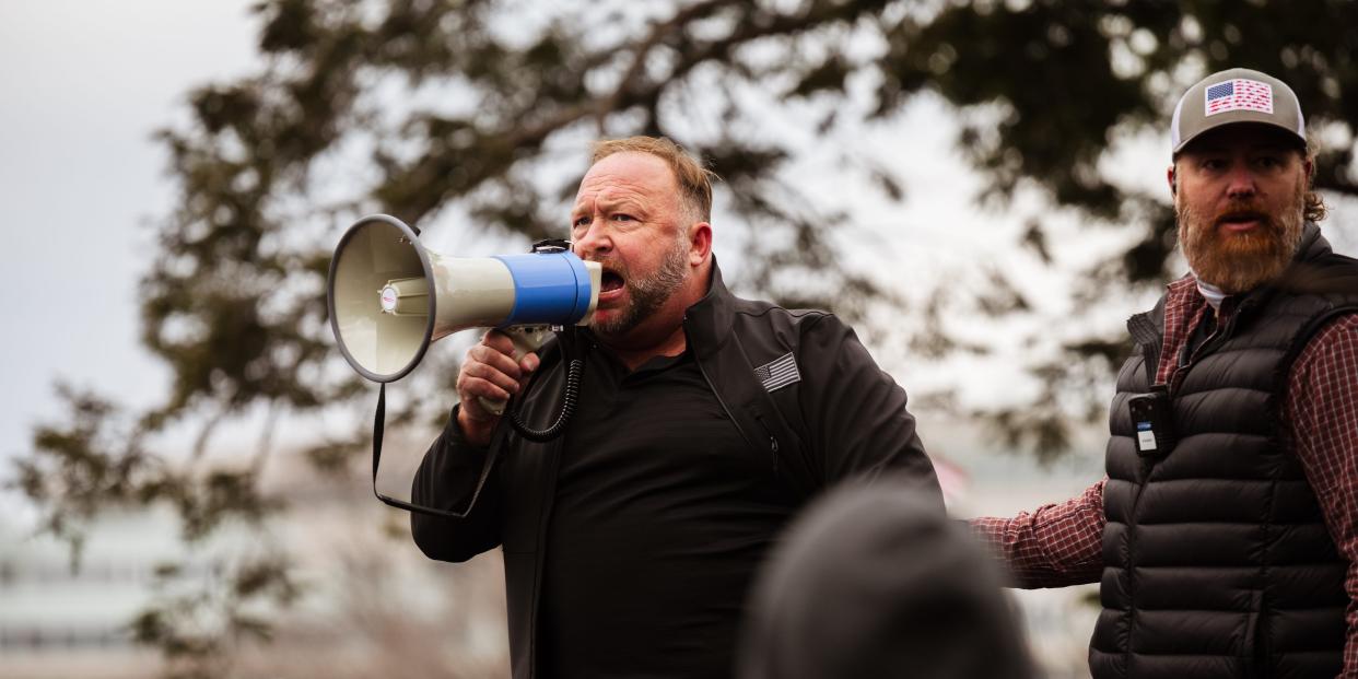 Alex Jones with bullhorn