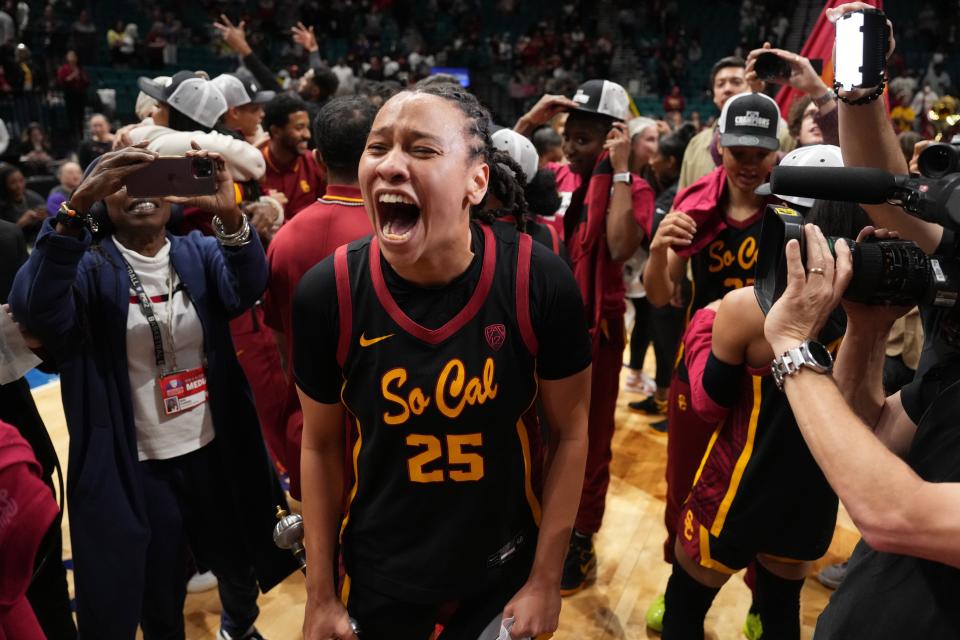 Southern California Trojans guard McKenzie Forbes (25) celebrates after the Pac-12 Tournament women's championship game against the Stanford Cardinal at MGM Grand Garden Arena.