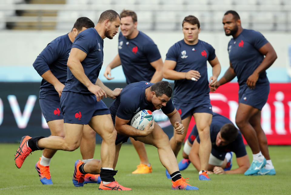 French rugby team players practise during a training session in Tokyo, Japan, Thursday, Sept. 19, 2019. The Rugby World Cup starts Friday, Sept. 20, with Japan playing Russia, and ends with the final on Nov. 2. (AP Photo/Christophe Ena)