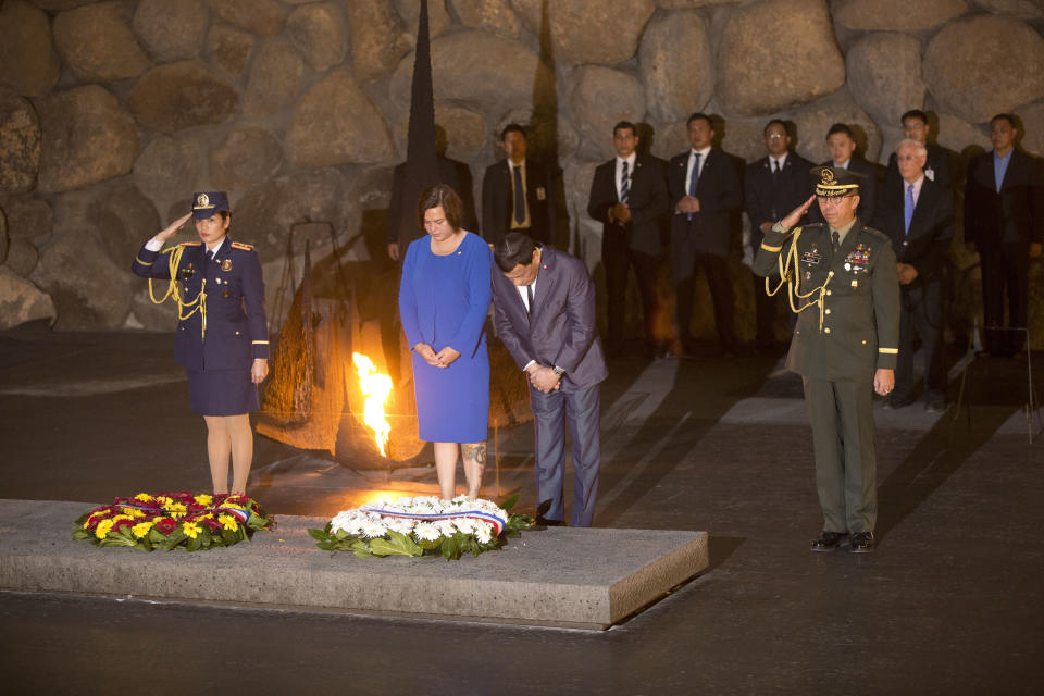 Philippine President Rodrigo Duterte and his daughter Sara attend a memorial ceremony at the Yad Vashem Holocaust Memorial in Jerusalem, Monday, Sept 3, 2018. (AP Photo/Oded Balilty)