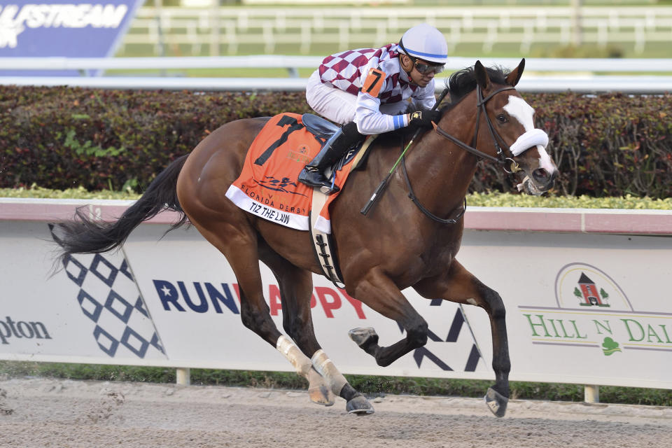 In this image provided by Gulfstream Park, Tiz the Law, riddren by Manuel Franco, wins the Florida Derby horse race at Gulfstream Park, Saturday, March 28, 2020, in Hallandale Beach, Fla. (Ryan Thompson/Coglianese Photos, Gulfstream Park via AP)