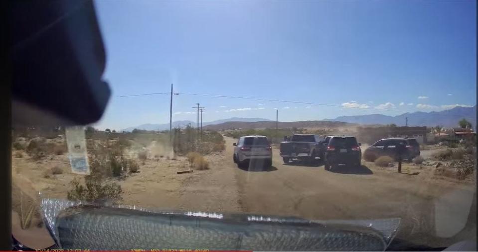 A video from the Riverside County District Attorney's Office shows officers shoot and arrest murder suspect in Desert Hot Springs.