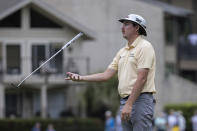 Joel Dahmen flips his club after missing a birdie putt on the 16th green during the first round of the RBC Heritage golf tournament, Thursday, April 13, 2023, in Hilton Head Island, S.C. (AP Photo/Stephen B. Morton)