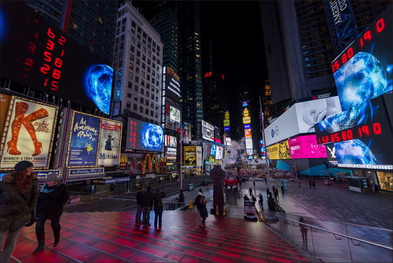 A view of the art installation "Apollo XVIII," which combines archival NASA footage with new digital work by the artist Marco Brambilla. The exhibit will be on display in New York's Times Square from 11:57 p.m. to midnight, every night in March