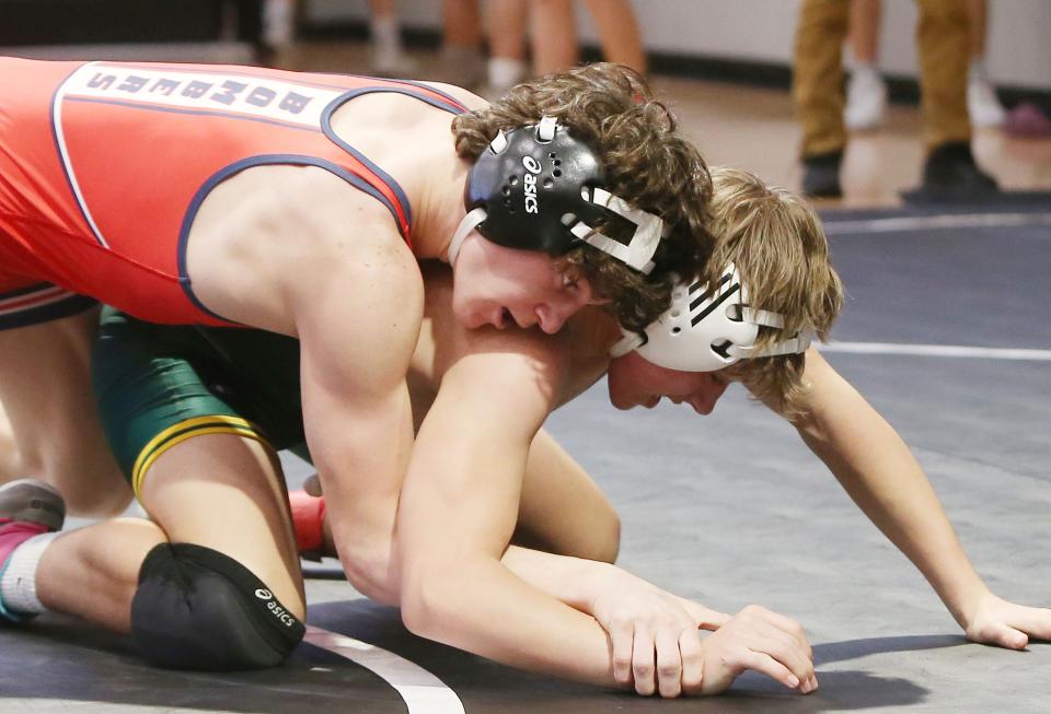 Ballard's Tucker Vitzthum takes down Cedar Rapids Kennedy's Jack Oostendorp during their 132-pound match at the Jack Mendenhall Invitational wrestling tournament at the Harrison Barnes Gymnasium and Court Saturday, Jan. 7, 2023 in ,Ames, Iowa. Photo by Ames Tribune-USA TODAY Network.