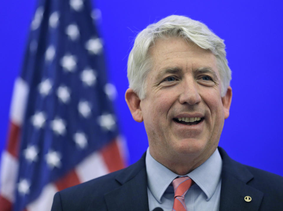 FILE - In this Dec. 18, 2013 file photo, Virginia Attorney General-elect Mark Herring smiles during a news conference at the Capitol in Richmond, Va. A federal judge ruled Thursday, Feb. 13, 2014 that Virginia's ban on same-sex marriage is unconstitutional, making it the first state in the South to have its voter-approved prohibition overturned. (AP Photo/Steve Helber, File)