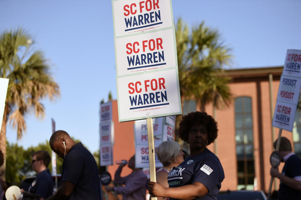 Supporters of Massachusetts Sen. Elizabeth Warren rally for the Democratic presidential hopeful ahead of Majority Whip Jim Clyburn's "World Famous Fish Fry". Friday, June 21, 2019, in Columbia, S.C. (AP Photo/Meg Kinnard)