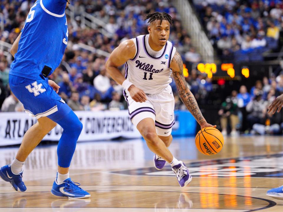 Keyontae Johnson dribbles through the Kentucky defense during the second round of the 2023 NCAA tournament.