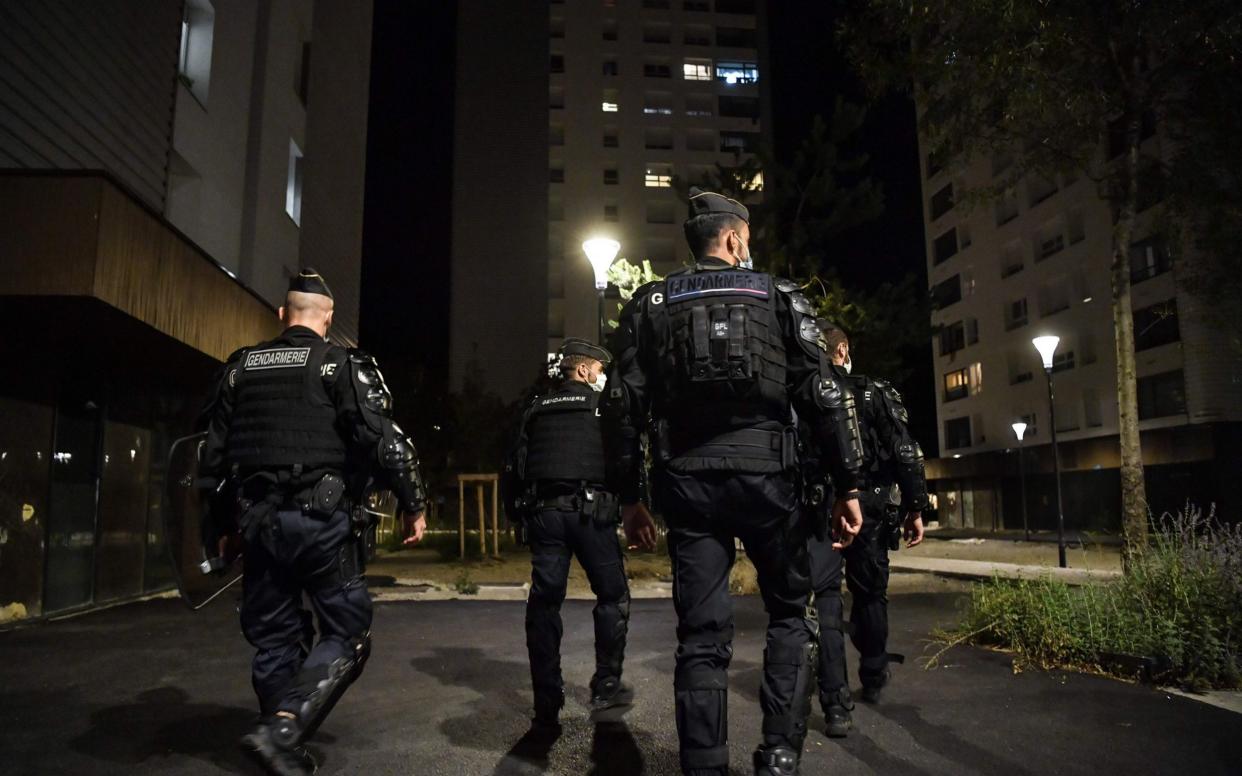 French gendarmes patrol in the Mistral District in Grenoble - AFP