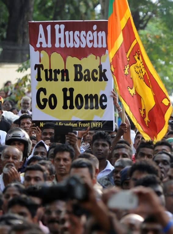 Members of a Sri Lankan fringe opposition group take part in a demonstration outside the United Nations offices against Zeid Ra'ad Al Hussein's visit