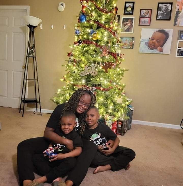 Destiny Huff and her two sons, 7 and 5. Huff's seven-year-old son was suspended three times within two weeks in the 2021-22 school year, an experience that she said traumatized her family.