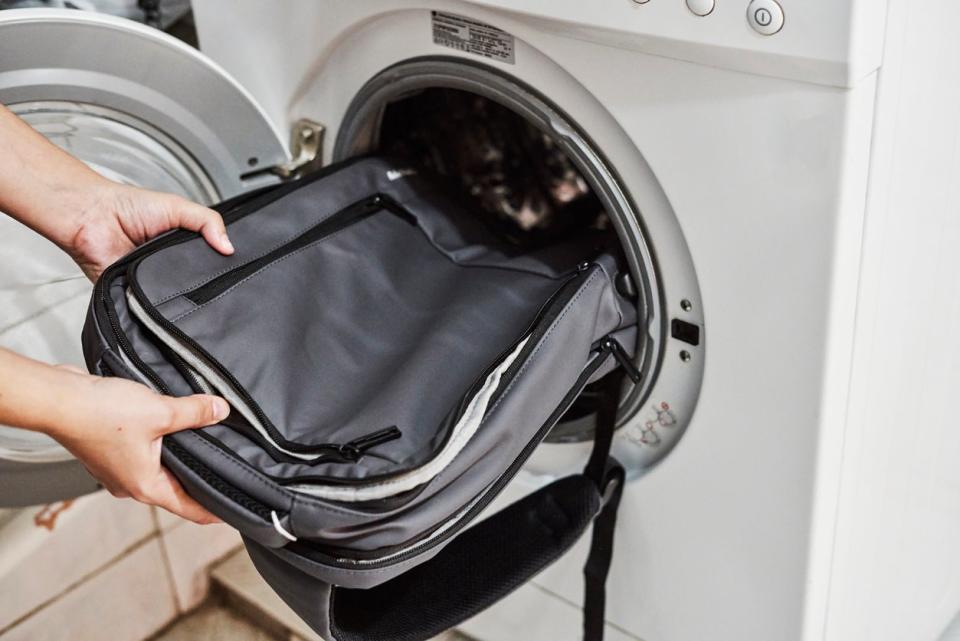 14 things you didn't know you can clean in your washing machine putting backpack in washing machine