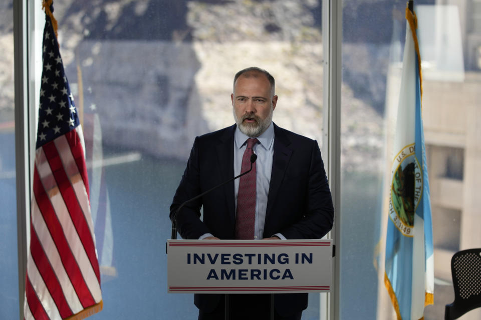 Tommy Beaudreau, Deputy Secretary of the Interior, speaks during a news conference on Lake Mead at Hoover Dam, Tuesday, April 11, 2023, near Boulder City, Nev. The Biden administration on Tuesday released an environmental analysis of competing plans for how Western states and tribes reliant on the dwindling Colorado River should cut their use. (AP Photo/John Locher)