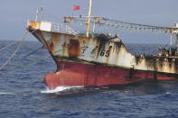 A Chinese-flagged vessel is anchored on the high seas beyond Ecuador’s territorial waters near the Galapagos Islands on July 19, 2021. In the summer of 2020, hundreds of Chinese vessels were discovered fishing for squid near the long-isolated Galapagos Islands, a UNESCO world heritage site that inspired 19th-century naturalist Charles Darwin and is home to some of the world’s most endangered species, from giant tortoises to hammerhead sharks. (Peter Hammarstedt/Sea Shepherd via AP)