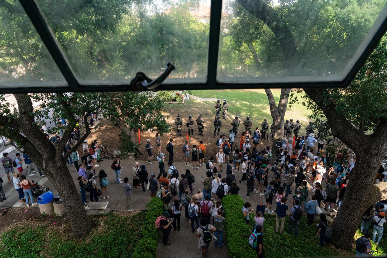 Protesters gather as law enforcement tries to detour them during a pro-Palestinian protest at the University of Texas Wednesday April 24, 2024.