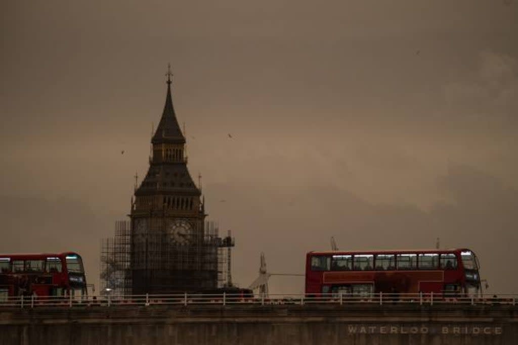 Dust clouds can produce strange weather effects like orange skies or red rain.  (AFP via Getty Images)