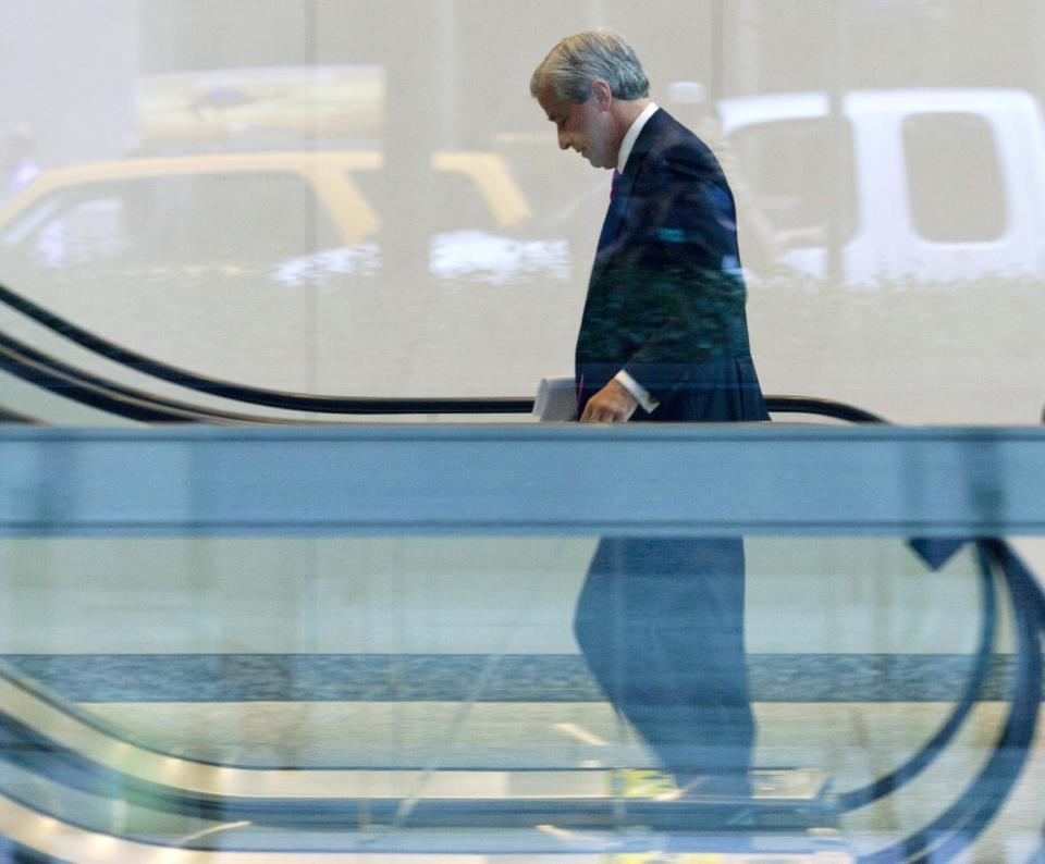 JPMorgan Chase CEO Jamie Dimon enters the company headquarters, Friday, July 13, 2012, in New York. JPMorgan Chase, the largest bank in the United States, said Friday that its loss from a highly publicized trading blunder had grown to $4.4 billion in the most recent quarter, more than double the bank's original estimate of $2 billion. (AP Photo/Jin Lee)