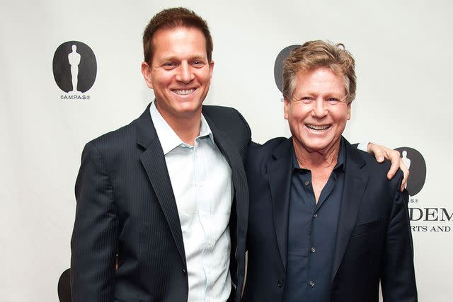 <p>Valerie Macon/Getty</p> Patrick O'Neal and Ryan O'Neal in November 2012