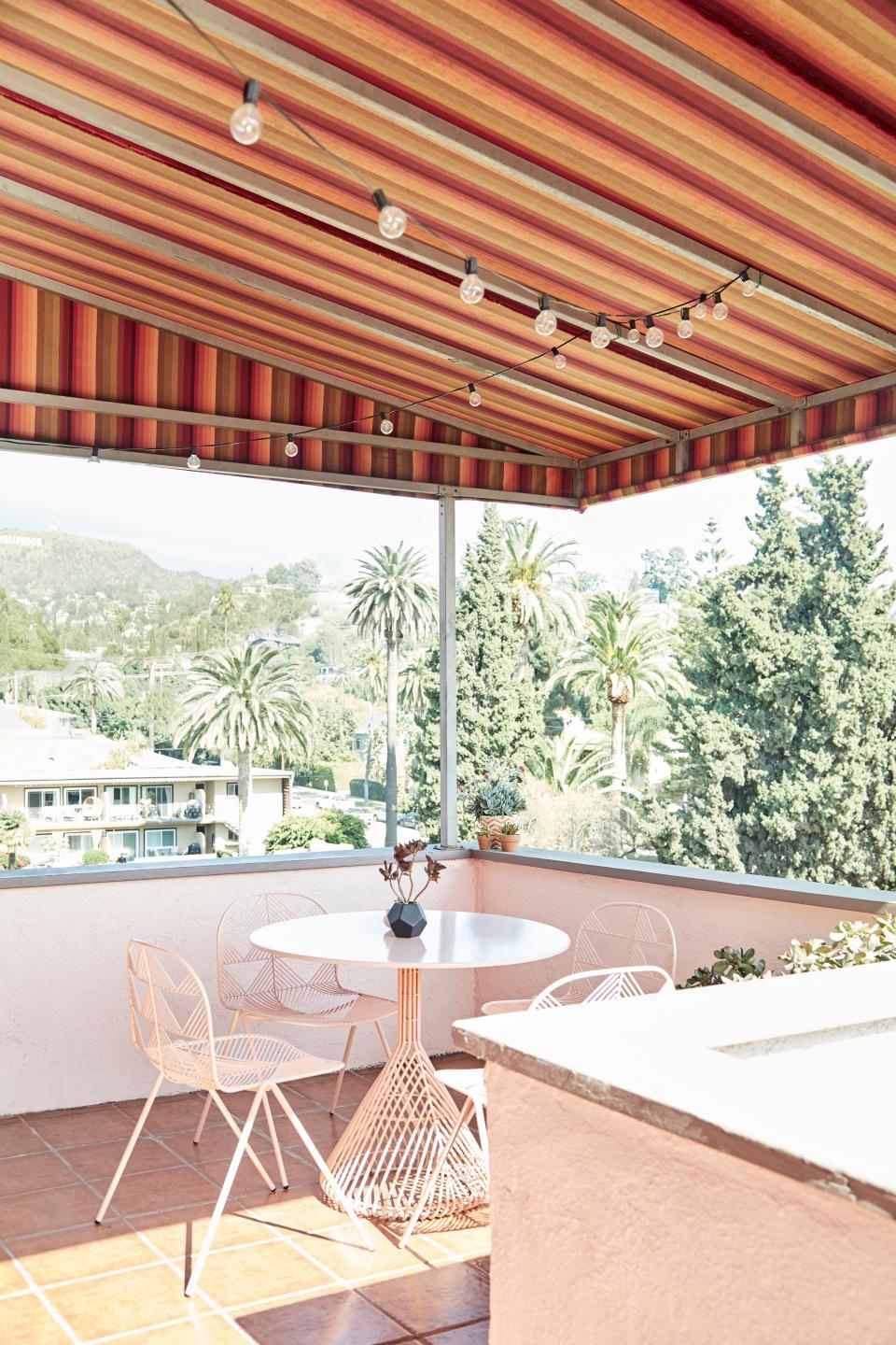 Franklin loves spending time basking in the sun on the patio. The outdoor furniture is from Bend Goods. The L.A.-based brand is all about design pieces that are as beautiful as they are functional.