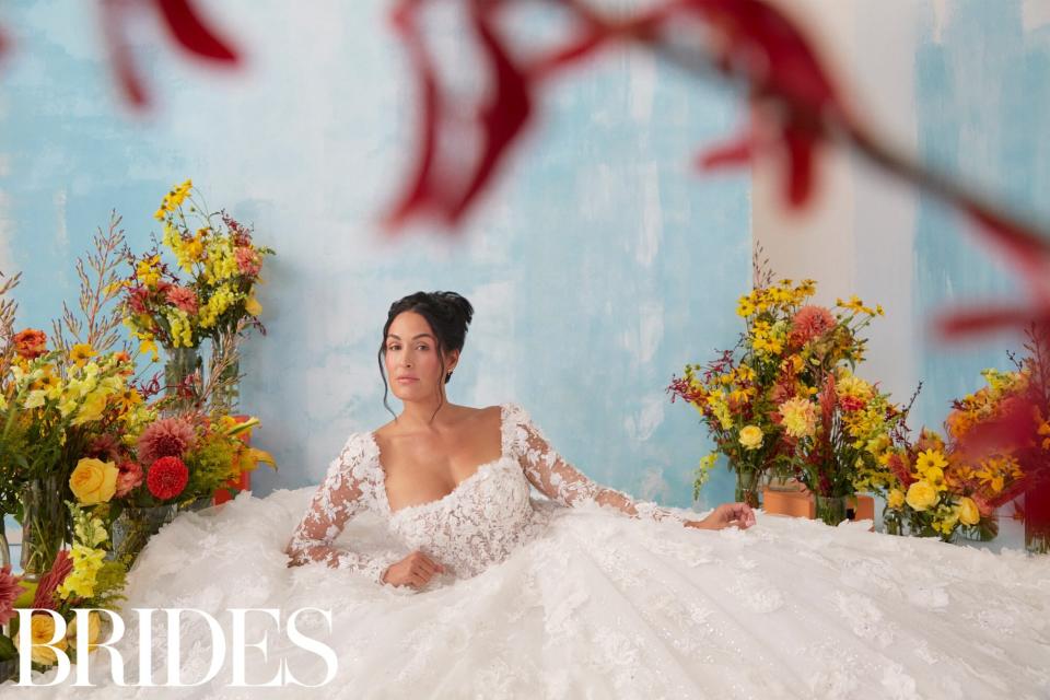 Nikki Bella Says She Bought 1 of Her 4 Wedding Dresses During Her Prior Engagement 5 Years Ago . PHOTO CREDIT: Tawni Bannister for Brides